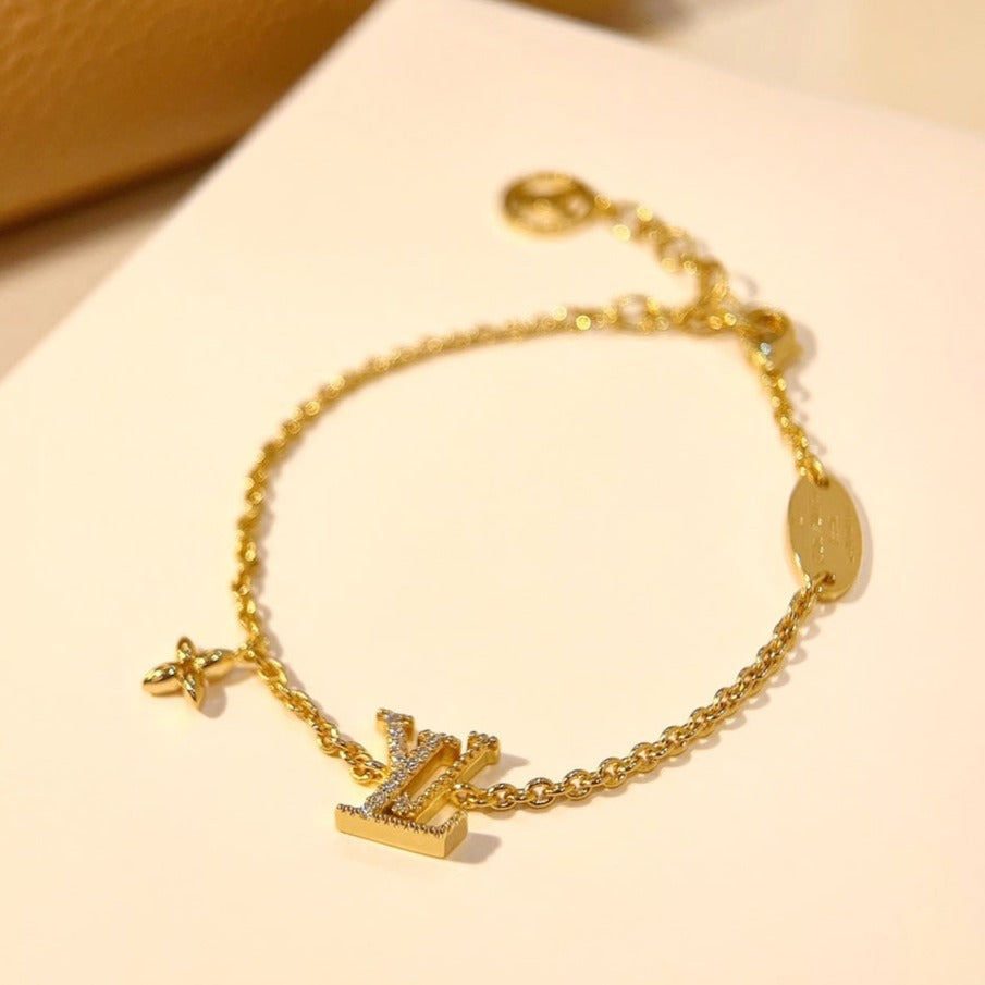 [Everoly JW] GOLDARMBAND MIT LOGO-STERNMOTIV