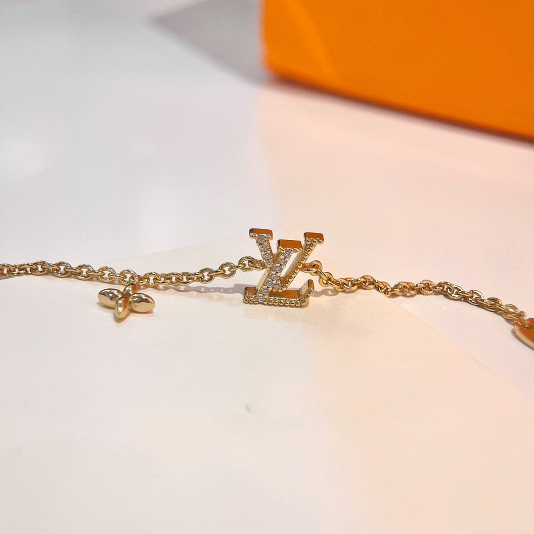 [Everoly JW] GOLDARMBAND MIT LOGO-STERNMOTIV