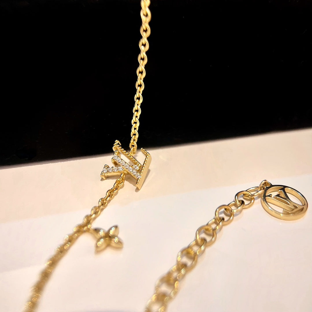 [Everoly JW] GOLDARMBAND MIT LOGO-STERNMOTIV