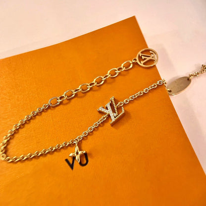 [Everoly JW] GOLDARMBAND MIT LOGO-STERNMOTIV