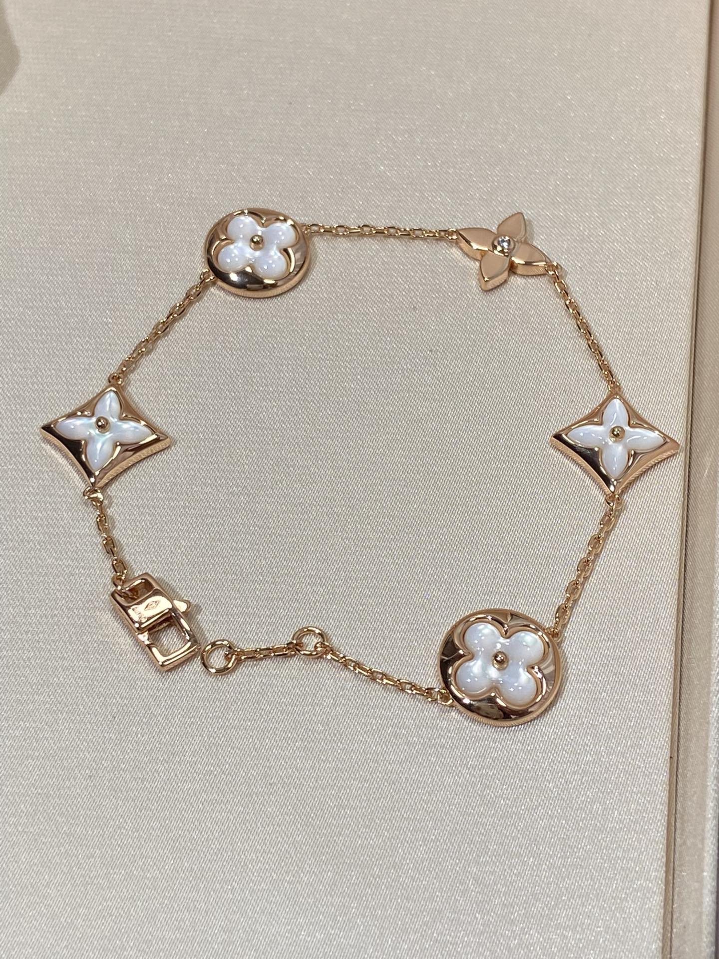 [Everoly JW]STAR AND SUN 5 MOTIF MOP PINK GOLD BRACELET