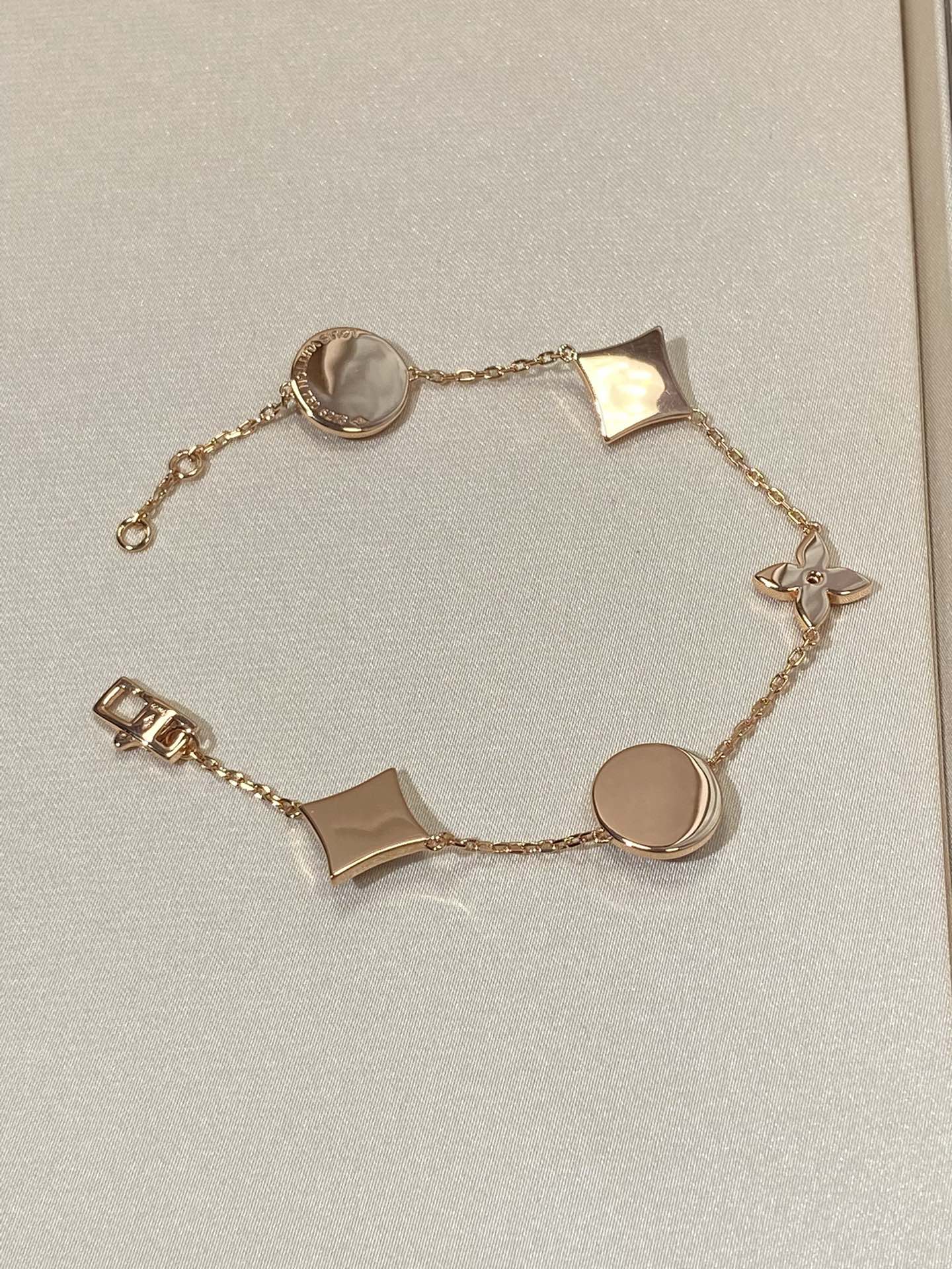 [Everoly JW]STAR AND SUN 5 MOTIF MOP PINK GOLD BRACELET