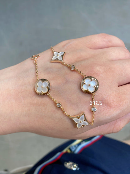 [Everoly JW]STAR AND SUN 4 MOTIF WHITE MOP PINK GOLD BRACELET