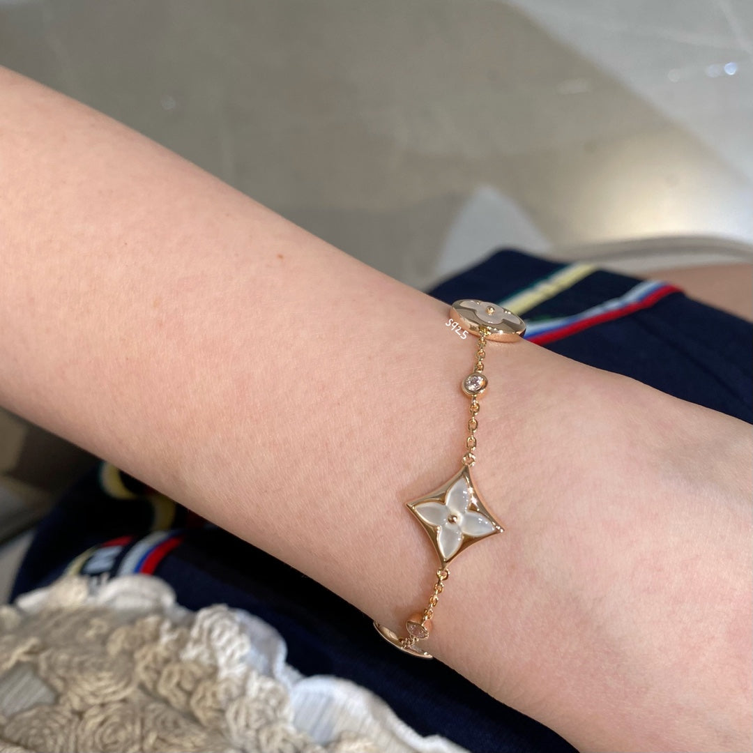 [Everoly JW]STAR AND SUN 4 MOTIF WHITE MOP PINK GOLD BRACELET