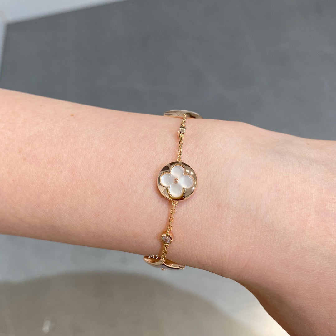 [Everoly JW]STAR AND SUN 4 MOTIF WHITE MOP PINK GOLD BRACELET