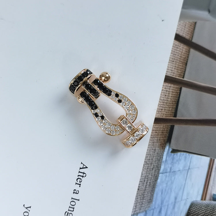 [Everoly JW]FORCE GROSSES HUFEISENARMBAND MIT SCHWARZ-WEISSEN DIAMANTEN UND ROSÉGOLD