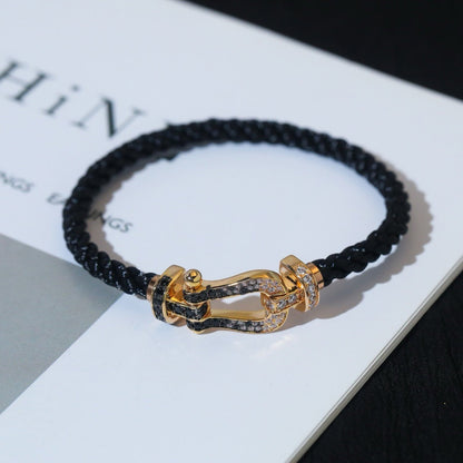 [Everoly JW]FORCE GROSSES HUFEISENARMBAND MIT SCHWARZ-WEISSEN DIAMANTEN UND ROSÉGOLD