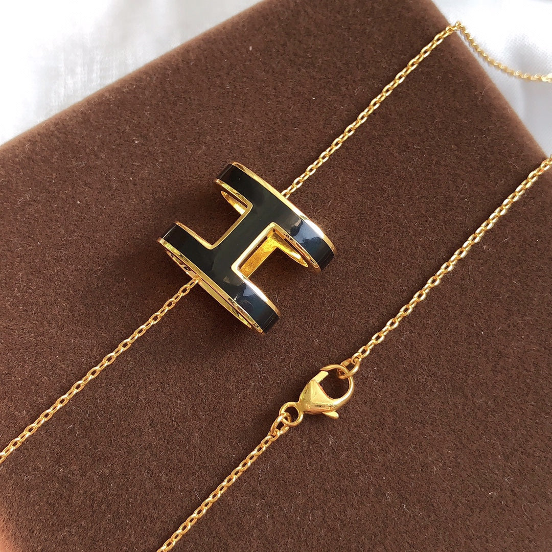 [Everoly JW]HM CLIC BLACK ENAMEL GOLD NECKLACE